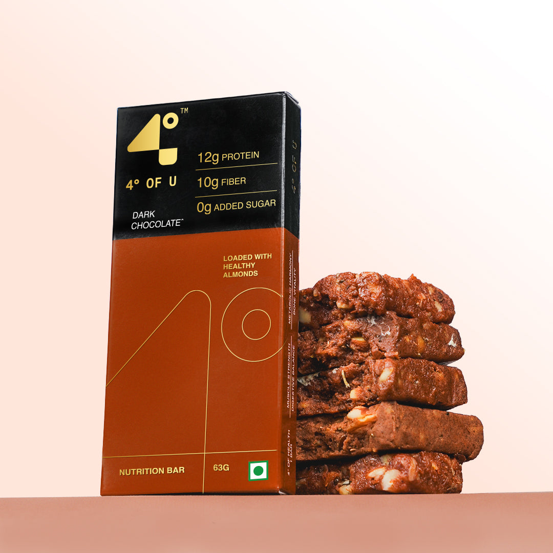 dark chocolate nutrition bars on a beige background